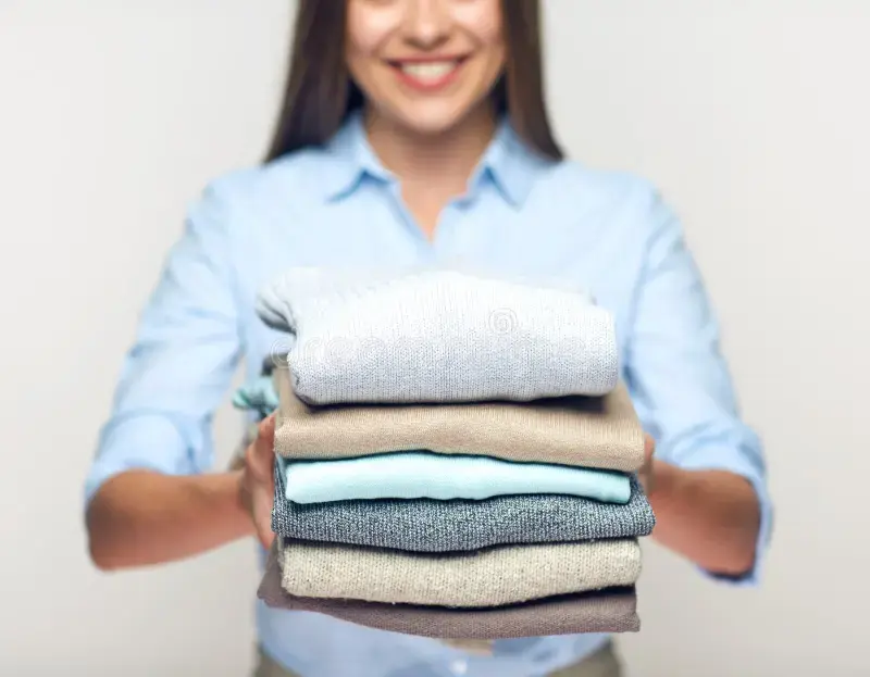 Woman in a laundry room with baskets